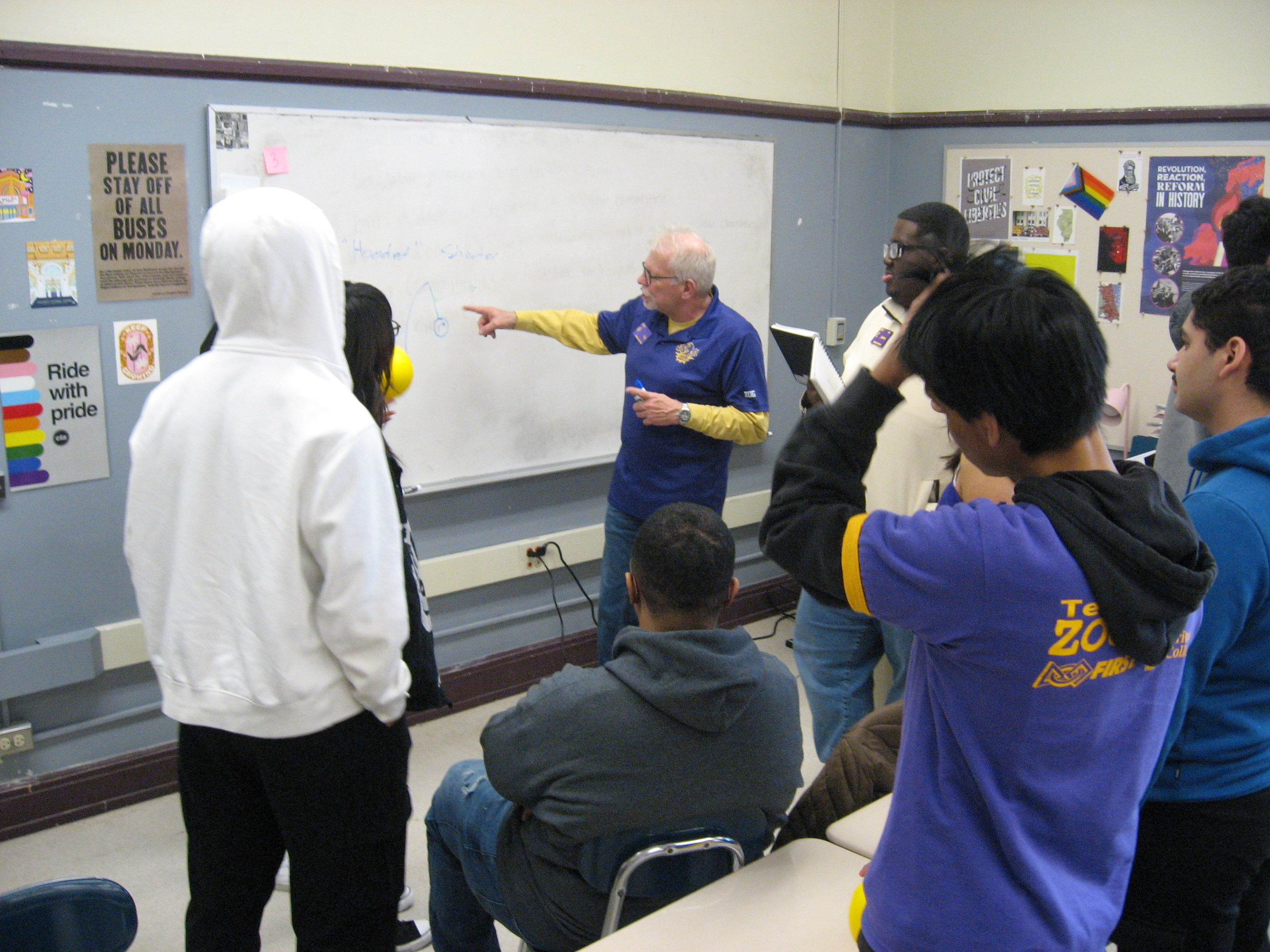 Team 2151 students learning together during a workshop